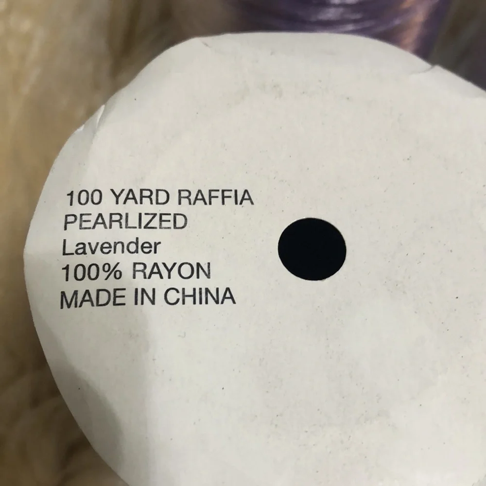 4 100 yard spools of lavender raffia